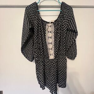 Everleigh Black and White Buttoned Romper with Bishop Sleeves